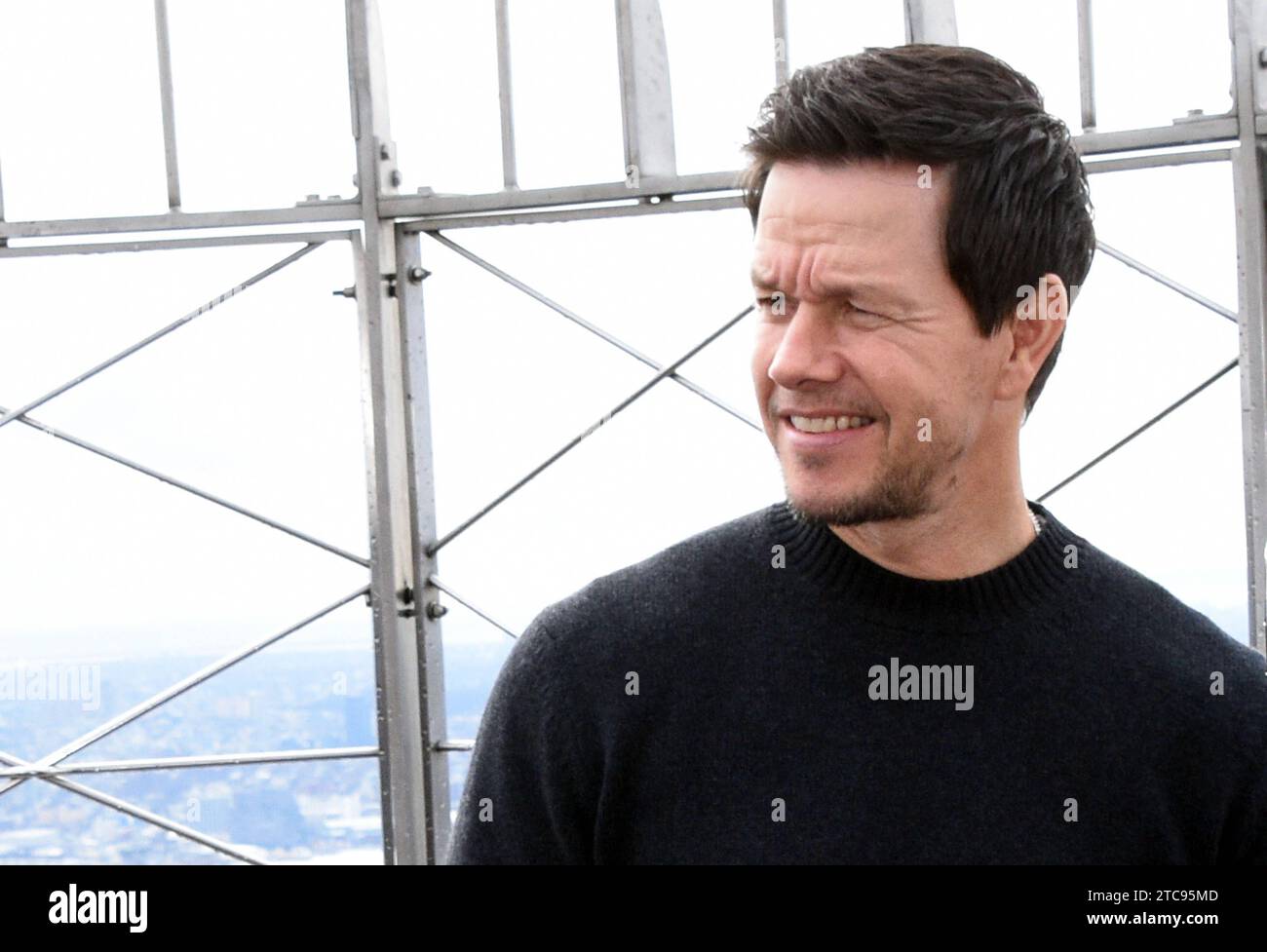 NEW YORK, NY - DECEMBER 11: Mark Wahlberg pictured as the cast of Apple TV The Family Plan promote the filmÕs premiere at the Empire State Building in New York City on December 11, 2023. Copyright: xMediaPunchx Credit: Imago/Alamy Live News Stock Photo