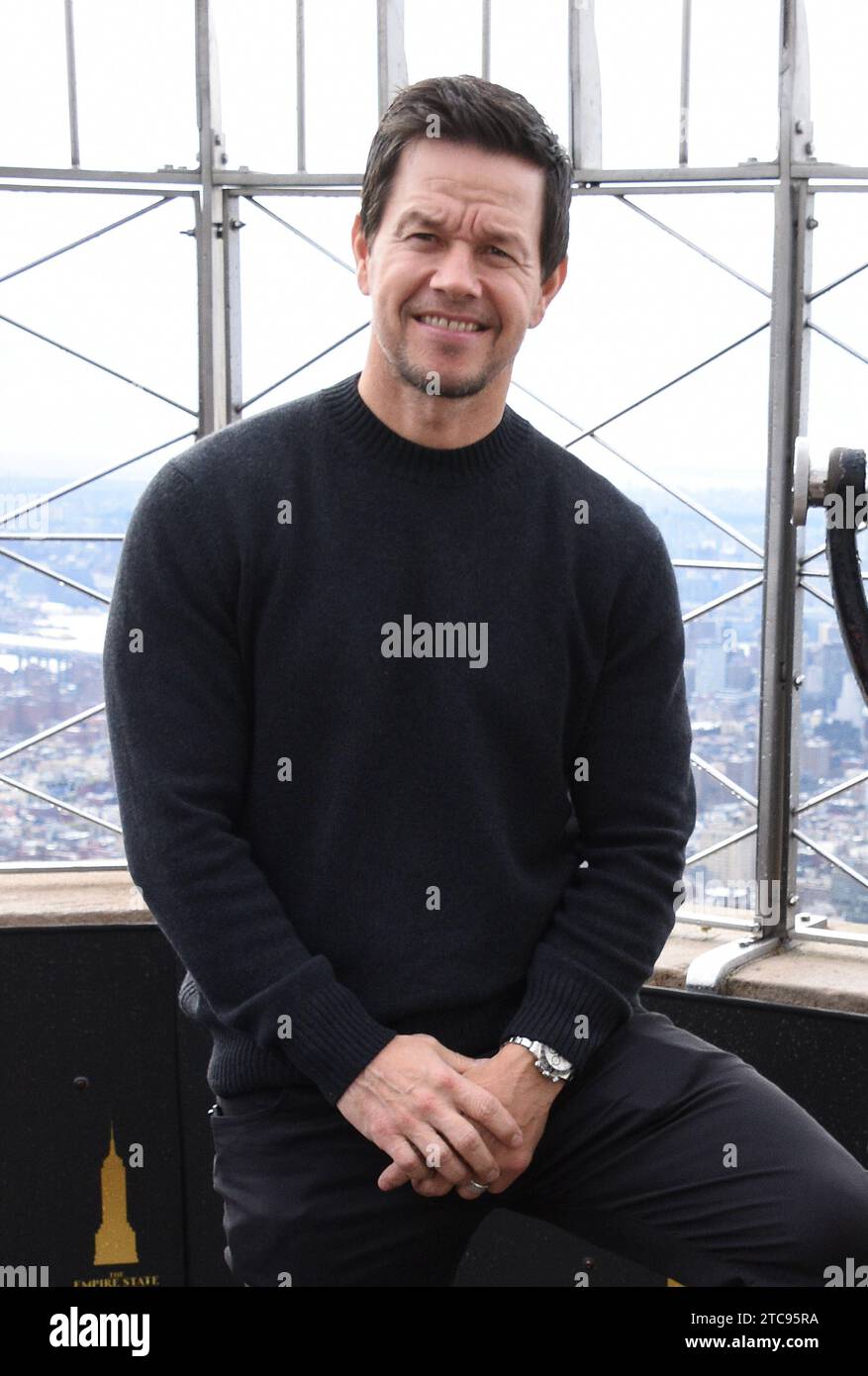 NEW YORK, NY - DECEMBER 11: Mark Wahlberg pictured as the cast of Apple TV The Family Plan promote the filmÕs premiere at the Empire State Building in New York City on December 11, 2023. Copyright: xMediaPunchx Credit: Imago/Alamy Live News Stock Photo