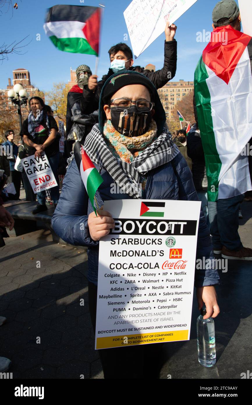 Pro-Palestinian rally held on Black Friday in New York City to protest the US support and complicity with Israel in bombing Gaza, indiscriminately killing thousands of civilians after the October 7, 2023 Hamas attack on Israel. Stock Photo