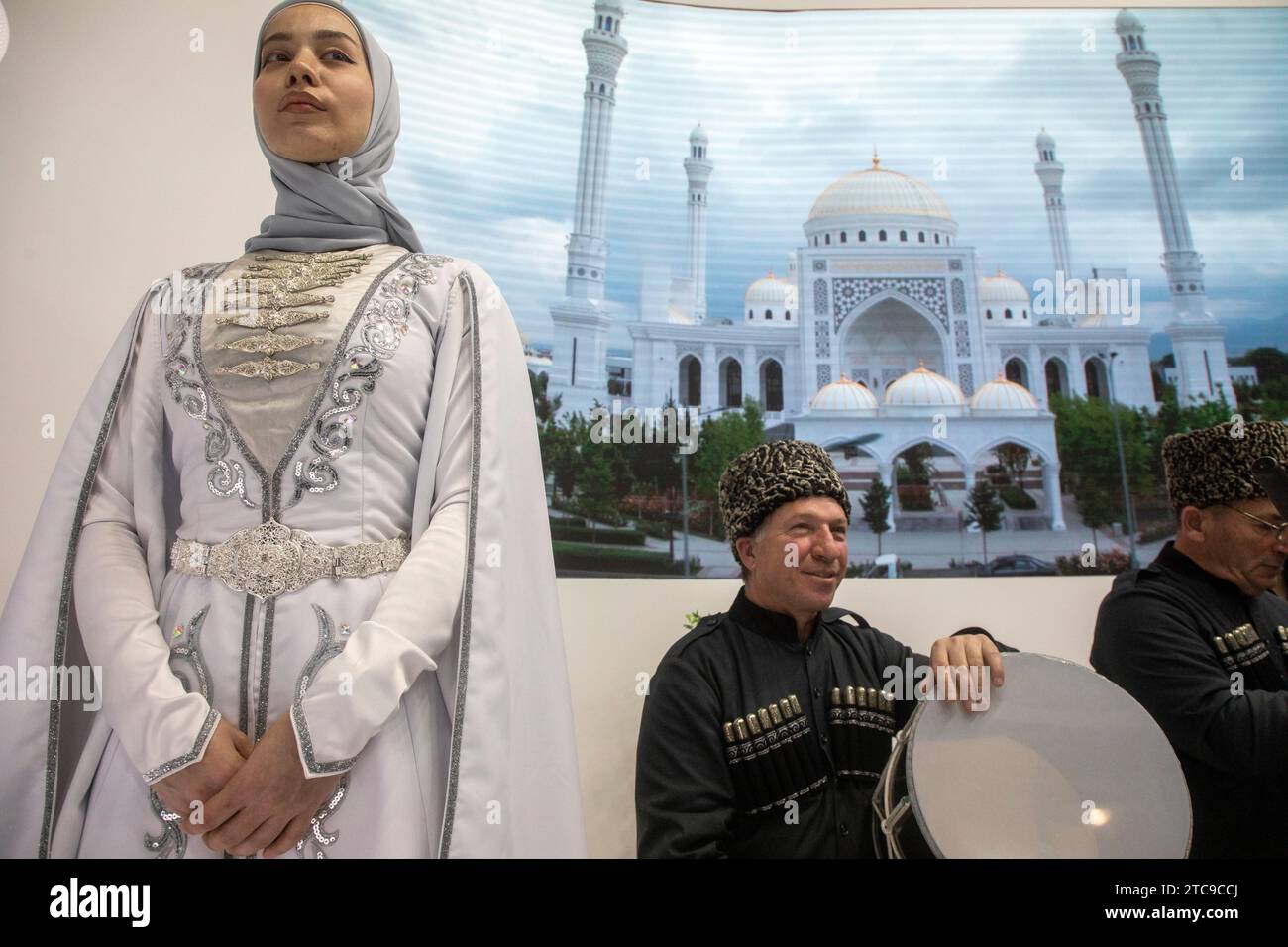 Moscow, Russia. 10th of December, 2023. People wearing traditional costumes are seen at the opening of Chechen Republic Day during the Russia Expo international exhibition and forum at the VDNKh exhibition centre in Moscow, Russia Stock Photo