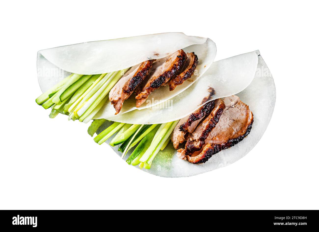 Traditional served Peking Duck with cucumber, green onion, in wheaten