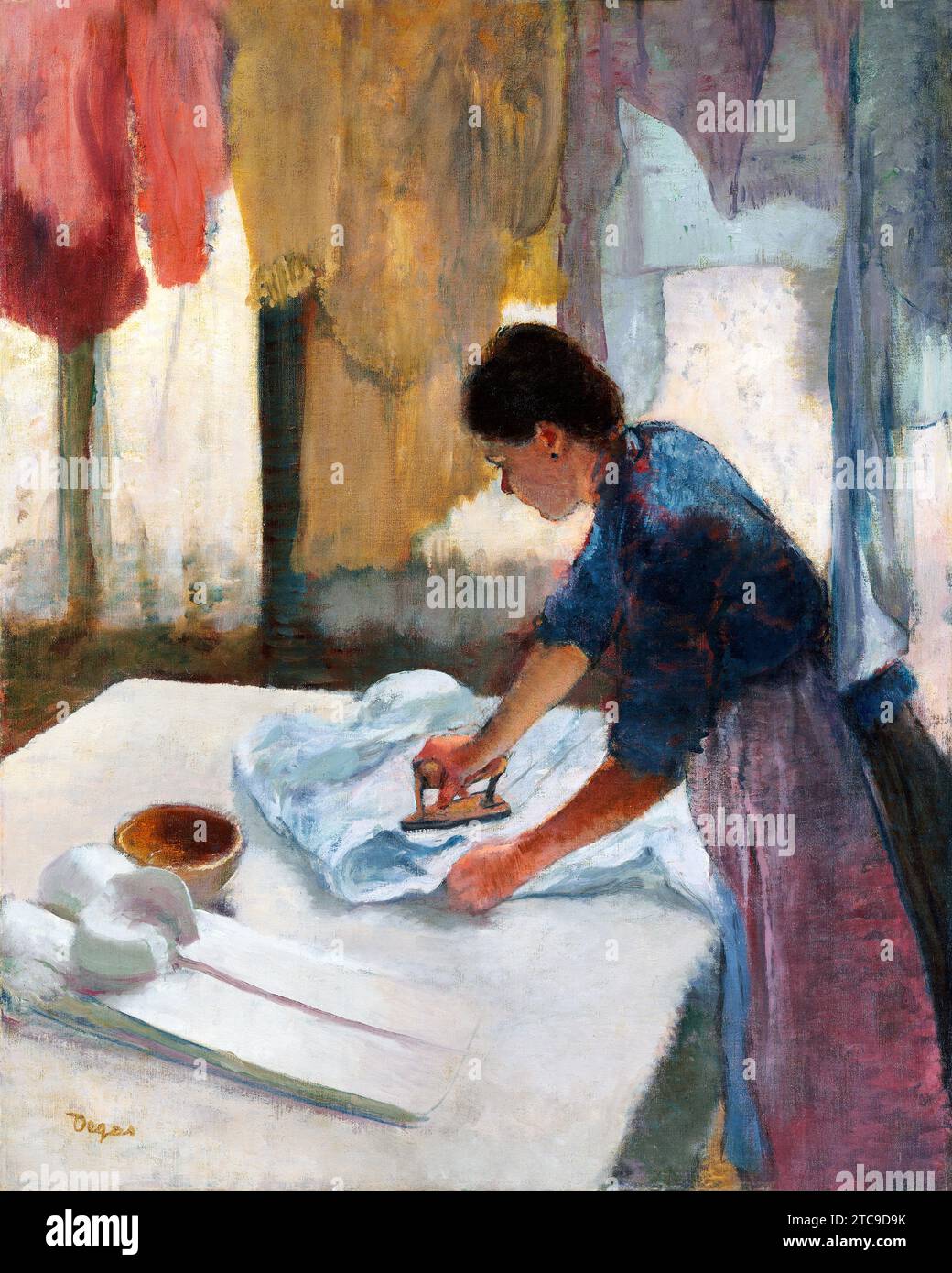 Woman Ironing (begun in 1876 and completed in 1887) by Edgar Degas. Stock Photo