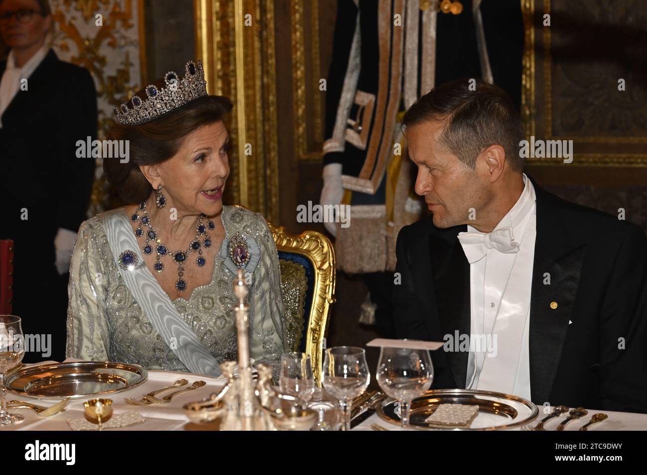 Stockholm, Sweden. 11th Dec, 2023. STOCKHOLM, SWEDEN 20231211Queen Silvia and Physics Laureate Ferenc Krausz at the King's Dinner for Nobel Laureates at the Royal Palace on Monday evening. Photo: Jonas Ekströmer/TT/Code 10030 Credit: TT News Agency/Alamy Live News Stock Photo