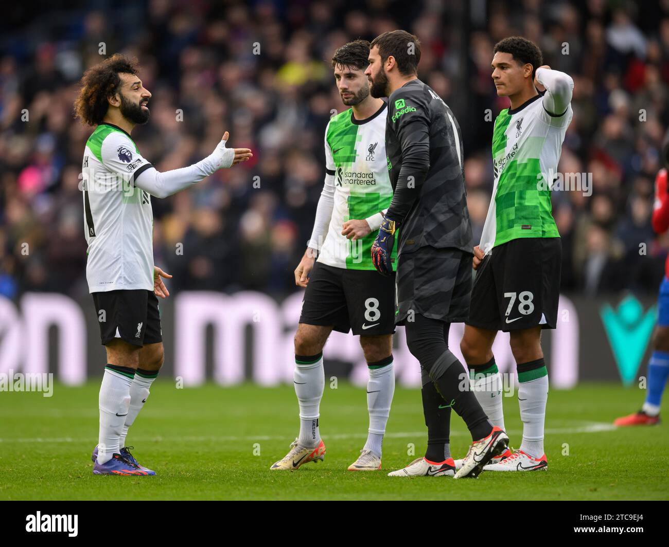 Crystal Palace v Liverpool - Premier League - Selhurst Park - 09th Dec, 2023. Liverpool's Mo Salah talks with Alisson Becker during the Premier League match at Selhurst Park. Picture Credit: Mark Pain / Alamy Live News Stock Photo
