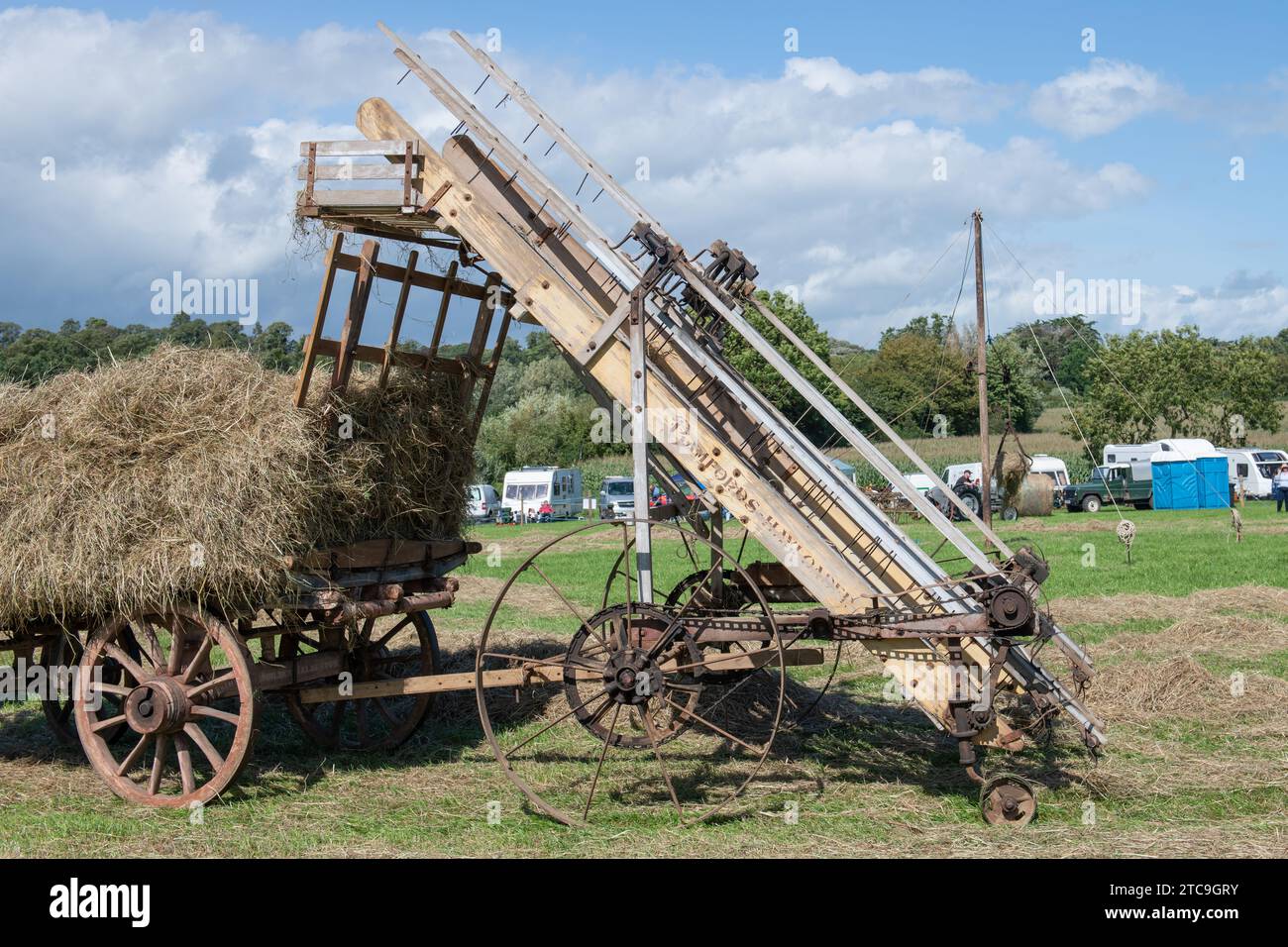 Drayton.Somerset.United kingdom.August 19th 2023.A Bamford hay loader from the 1920s is on show at a Yesterdays Farming event Stock Photo