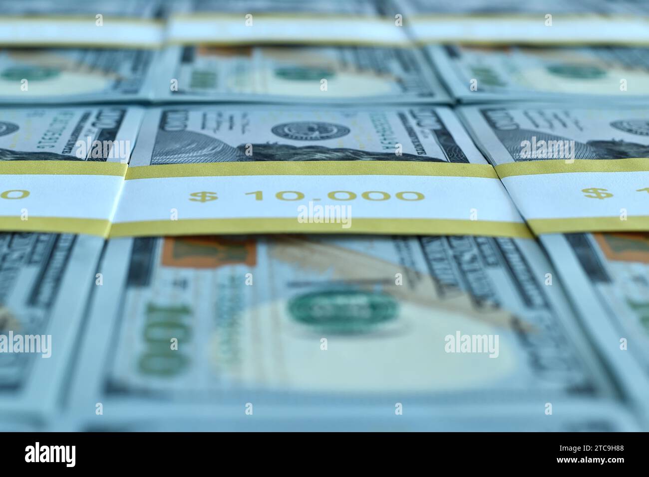One hundred dollars bills are stacked in a bundle. Business, finance and economic success concept. Close up Stock Photo