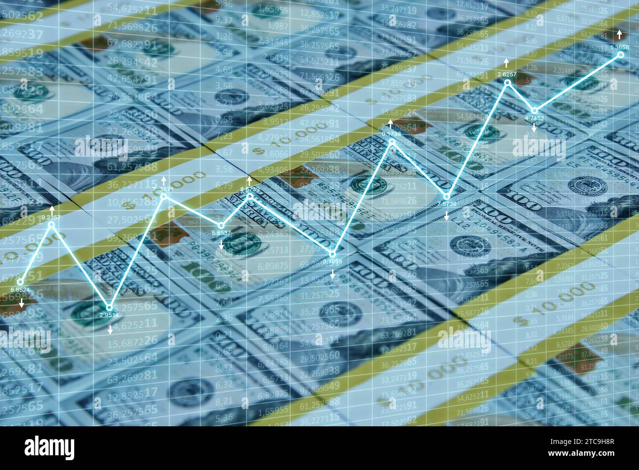 Many bundles of one hundred dollar bills tied with chart and stock data. Business and finance concept. Close up Stock Photo