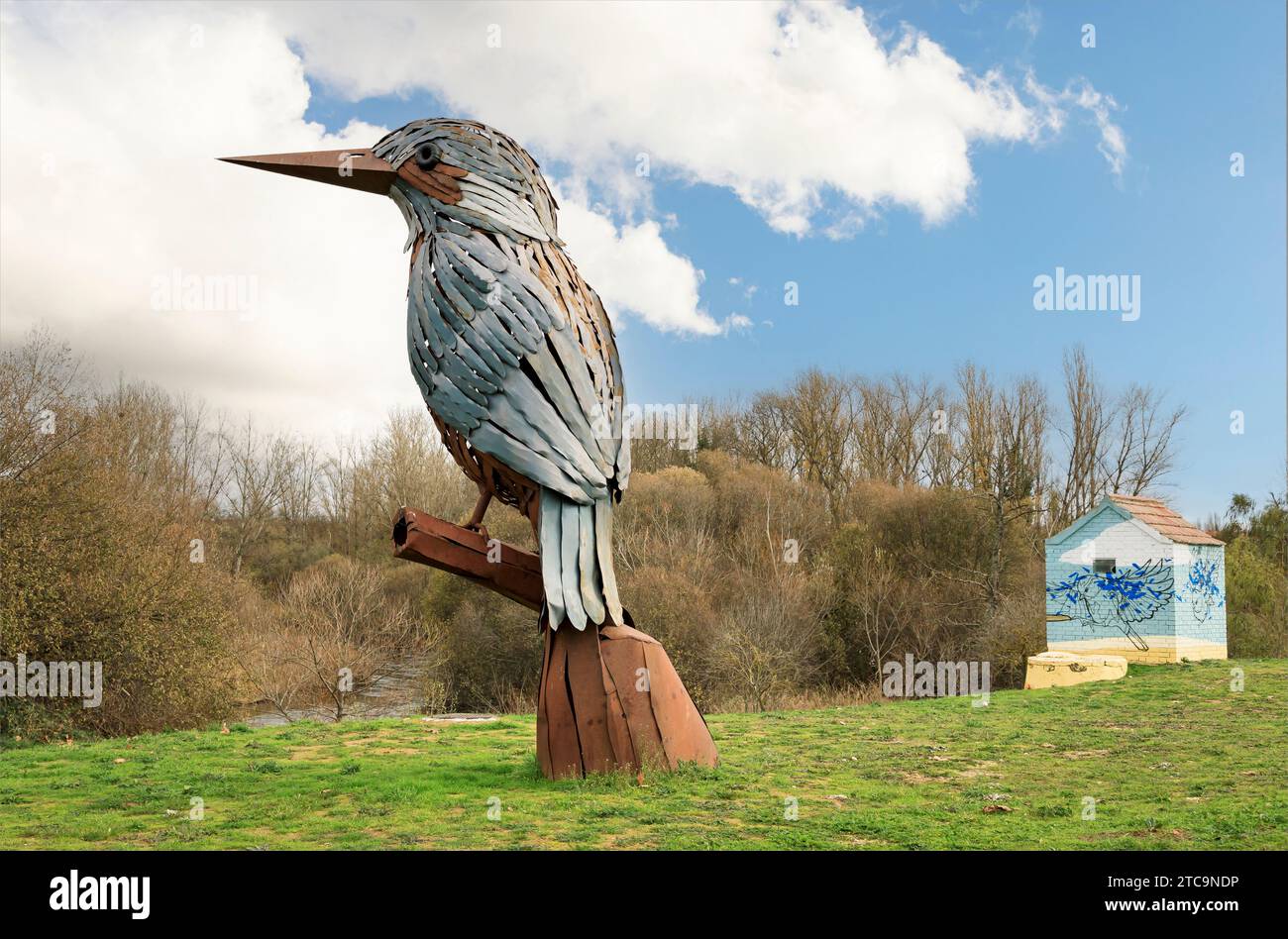 Salamanca, Castilla y Leon, Spain - December 9th 2023 - metal street art Kingfisher bird stood in a park Stock Photo