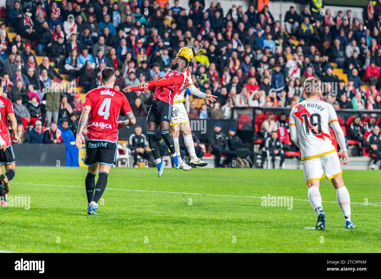 Madrid, Spain. 11th Dec, 2023. Jonathan Bamba of Celta Vigo seen in action against Ivan Balliu of Rayo Vallecano during the La Liga EA Sports 2023/24 football match between Rayo Vallecano vs Celta Vigo at Estadio Vallecas in Madrid, Spain. Credit: Independent Photo Agency/Alamy Live News Stock Photo