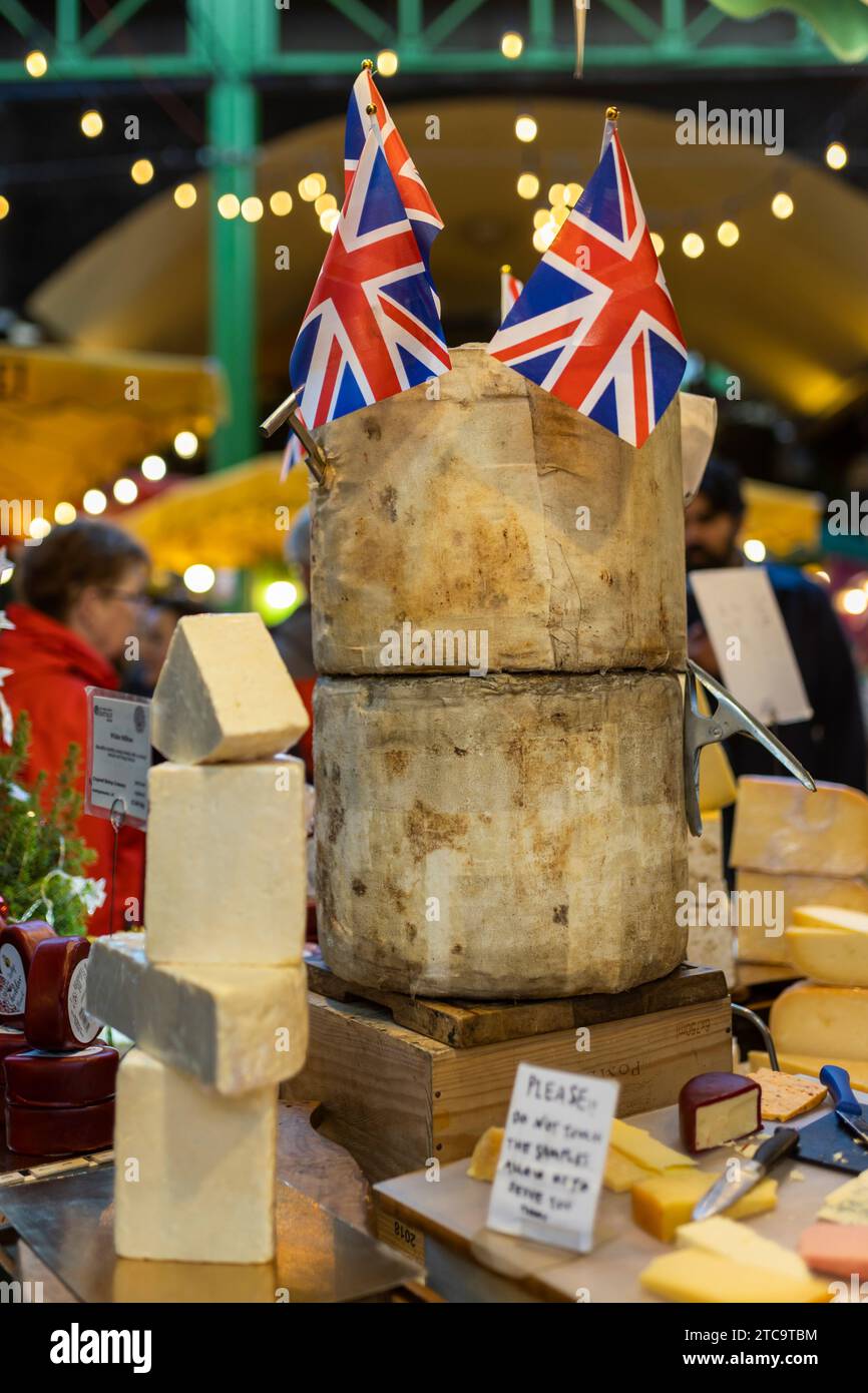 London, UK - December 10, 2023, Various types of cheeses at Borough Market Stock Photo