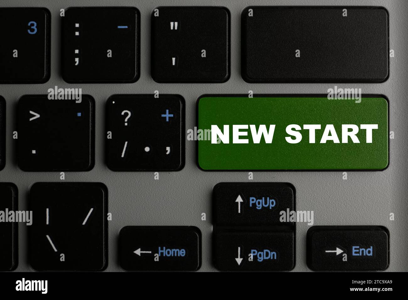 Button with text NEW START on modern computer keyboard, closeup Stock Photo