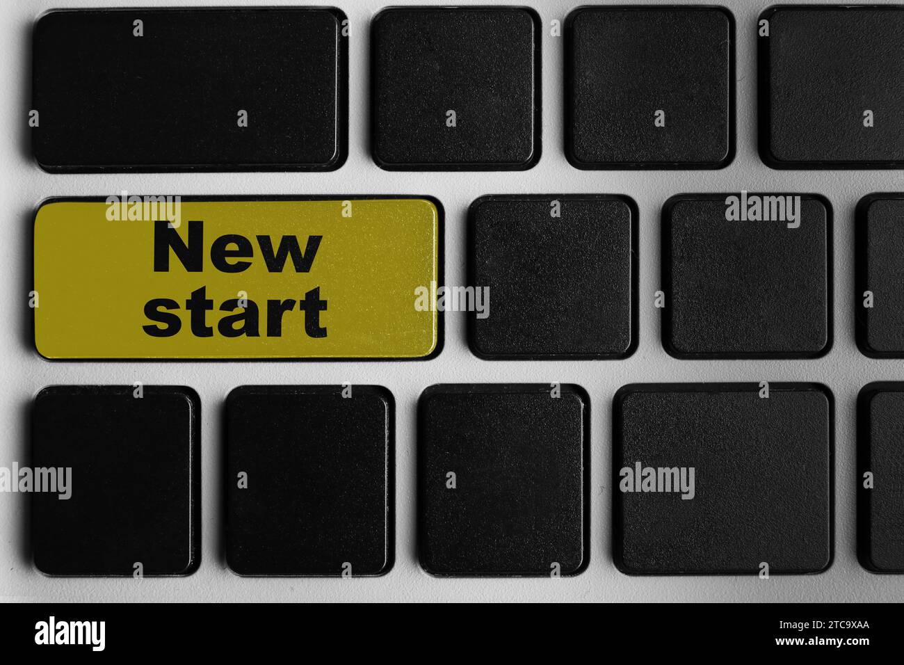 Button with text NEW START on modern computer keyboard, closeup Stock Photo