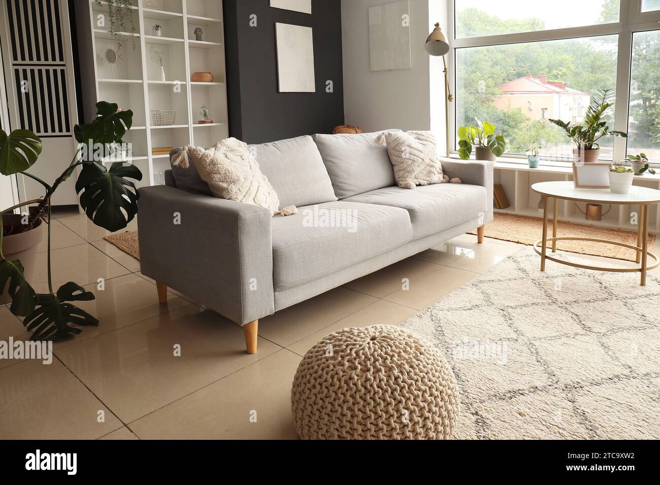 Interior of modern living room with grey sofa and coffee table Stock ...