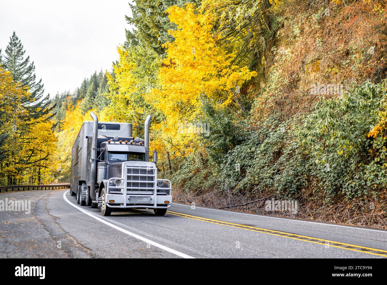 Classic heavy duty black American big rig semi truck tractor