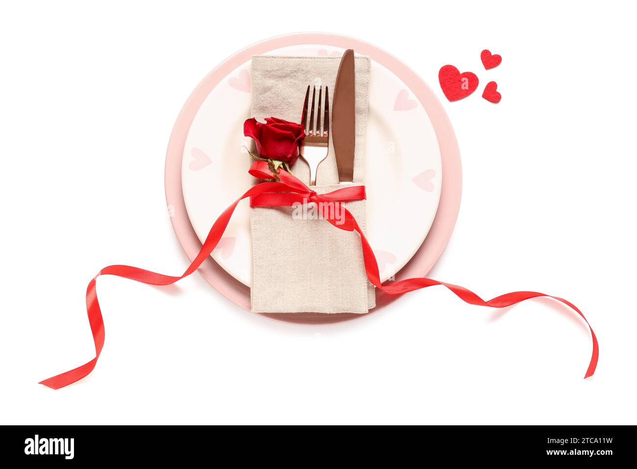 Beautiful table setting with red rose and hearts on white background ...