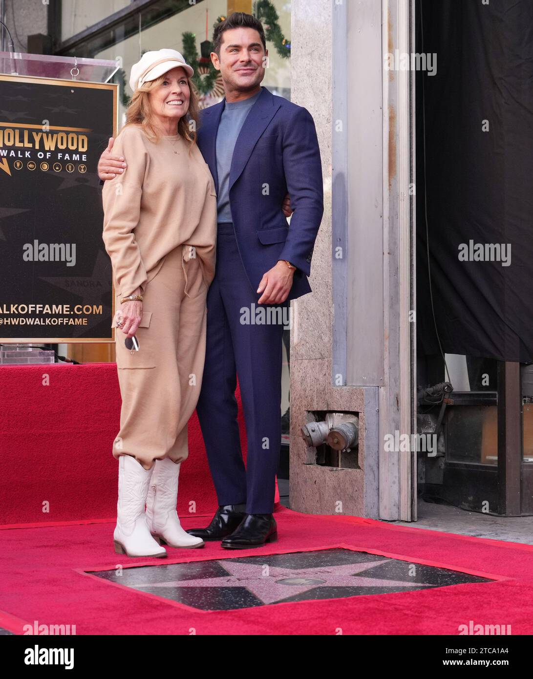 Los Angeles, USA. 11th Dec, 2023. (L-R) Mom Starla Baskett and Zac