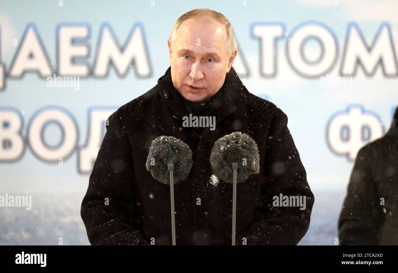 Severodvinsk, Russia. 11th Dec, 2023. Russian President Vladimir Putin delivers remarks during a flag raising ceremony for the Russian Navy Borei-class nuclear-powered ballistic missile submarines Emperor Alexander III and the Krasnoyarsk at the Sevmash Shipyard, December 12, 2023 in Severodvinsk, Arkhangelsk region, Russia. Credit: Kirill Iodas/Kremlin Pool/Alamy Live News Stock Photo