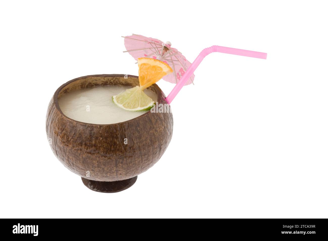 Pina Colada mixed drink with fruit garnish on white background Stock Photo