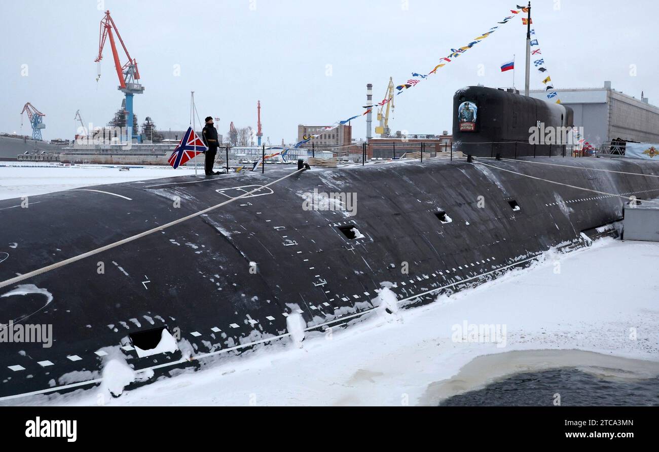 Severodvinsk, Russia. 11th Dec, 2023. Russian navy sailors stand at attention during a flag raising ceremony for the Russian Navy Borei-class nuclear-powered ballistic missile submarine Emperor Alexander III at the Sevmash Shipyard, December 11, 2023 in Severodvinsk, Arkhangelsk region, Russia. Credit: Mikhael Klimentyev/Kremlin Pool/Alamy Live News Stock Photo