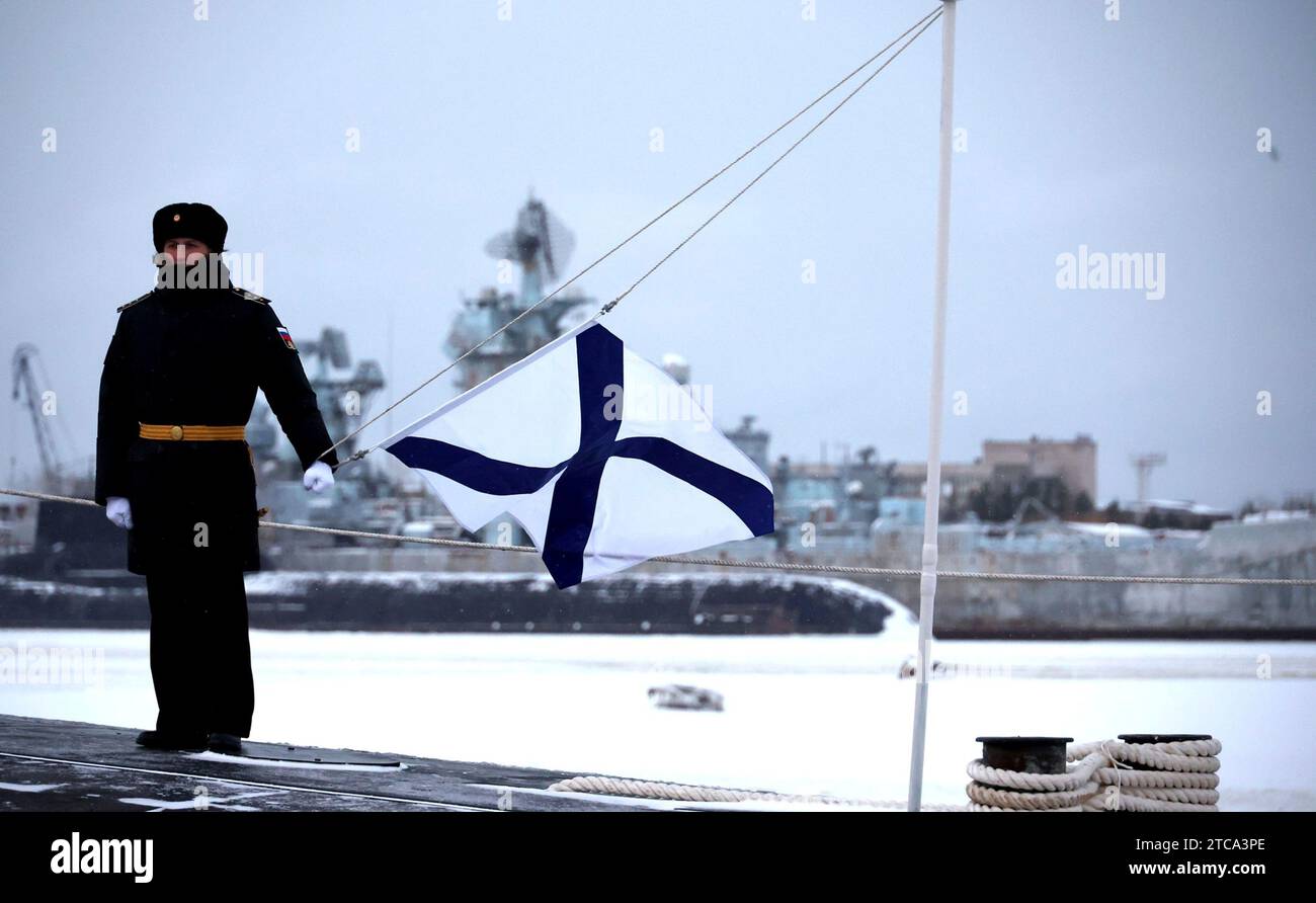 Severodvinsk, Russia. 11th Dec, 2023. Russian navy sailors stand at attention during a flag raising ceremony for the Russian Navy Borei-class nuclear-powered ballistic missile submarine Krasnoyarsk at the Sevmash Shipyard, December 11, 2023 in Severodvinsk, Arkhangelsk region, Russia. Credit: Mikhael Klimentyev/Kremlin Pool/Alamy Live News Stock Photo