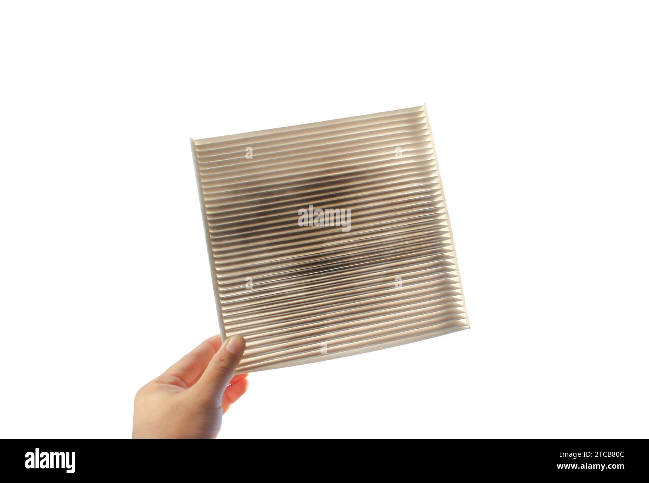 Car air conditioner filter isolated , filter clogged and dirty in a