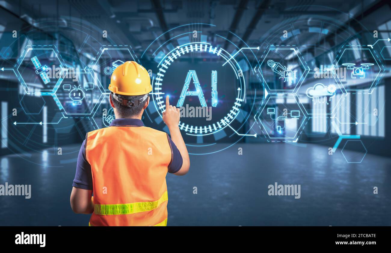 Worker or engineer work with ai with graphic display in factory Stock Photo
