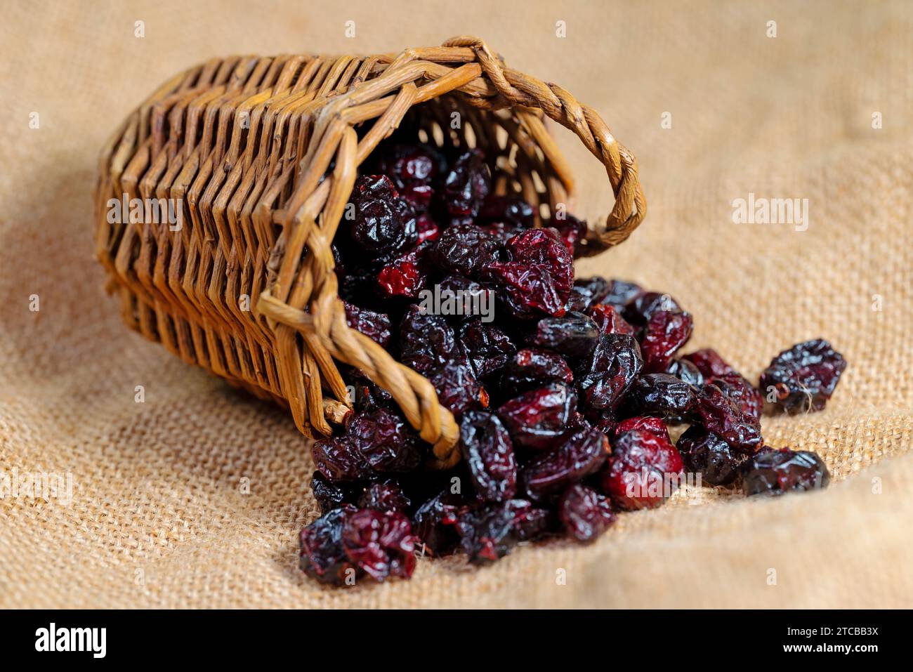 Dried cranberries in a basket Stock Photo