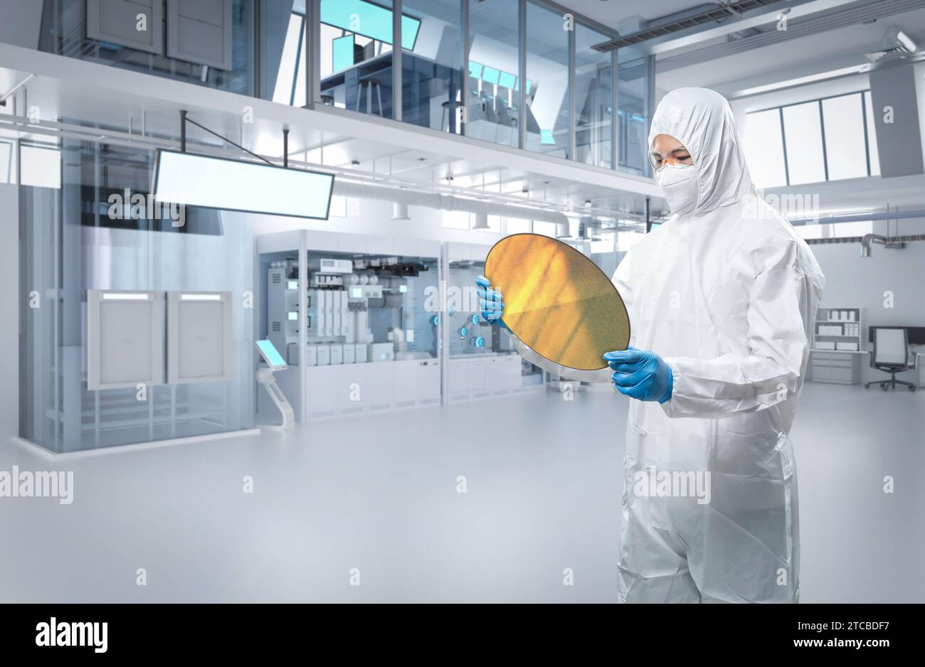 Worker or engineer wears protective or coverall suit with silicon wafer ...