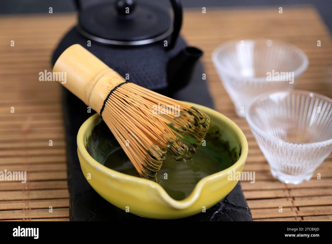 Matcha Whisk on Green Tea Mix Bowl, Japan Tea Ceremony. Selective Focus Stock Photo