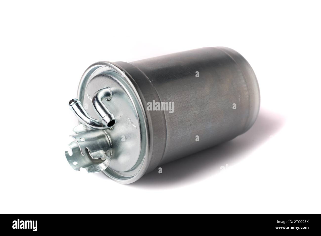 A new fuel filter enclosed in a metal casing with an inlet and outlet