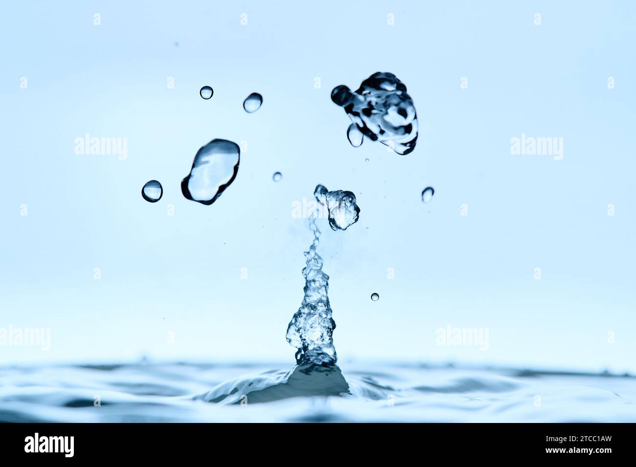 The process of boiling water, a stream of water shooting out of a ...