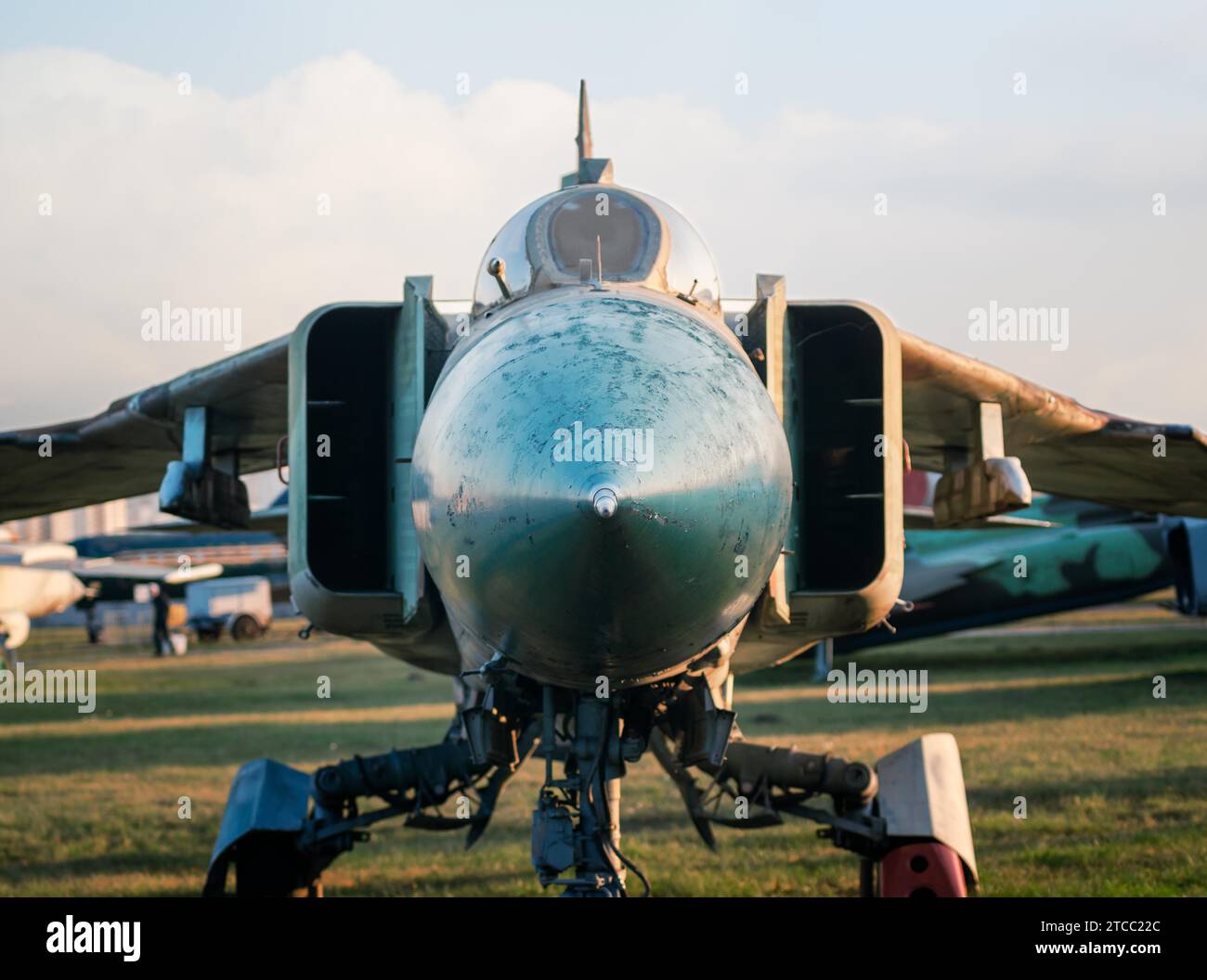 Old army military combat fighter aircraft at the airport close up Stock Photo