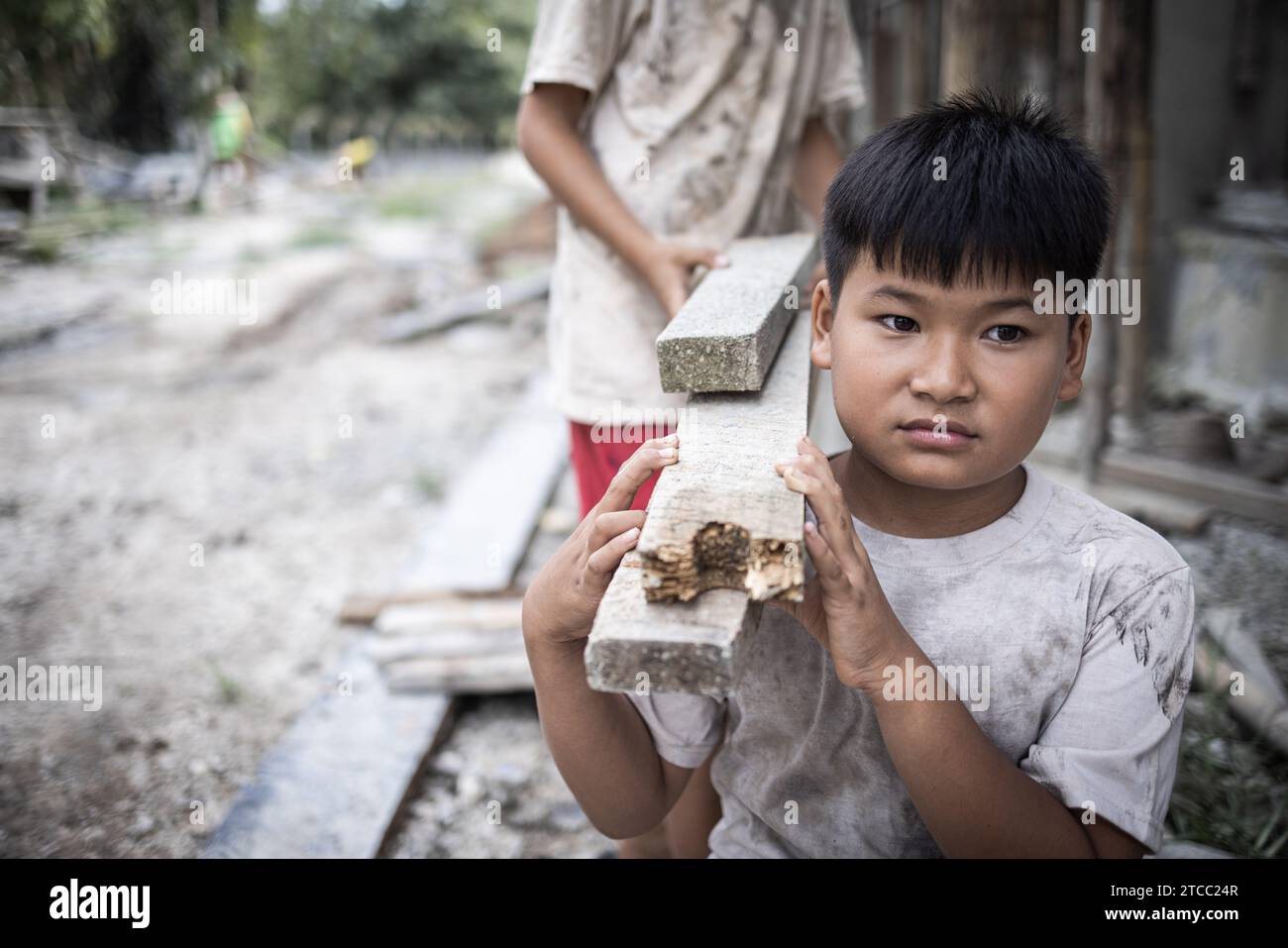 Poor Laborer Concept of child labor, poor children being victims of construction ...