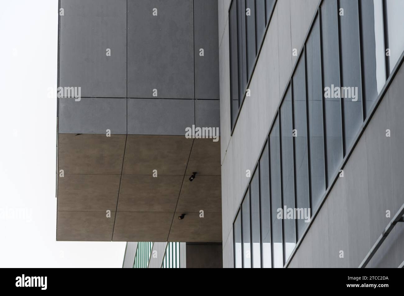 Fragment of a concrete building with empty windows Stock Photo