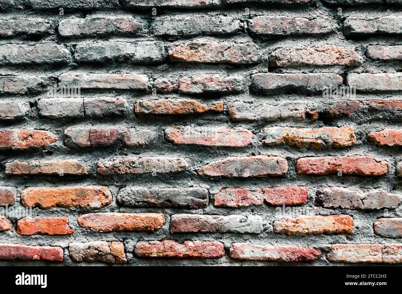 Pattern background of old antique rough vintage brick stone wall close ...