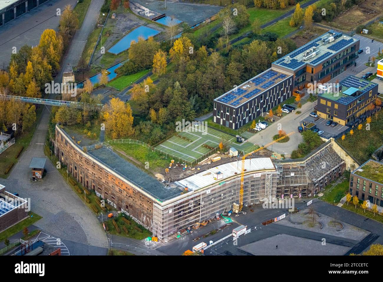 Aerial view, construction site with renovation and facade scaffolding at the Colosseum historic building, Gebäude Kultur Ruhr GmbH organization for ar Stock Photo