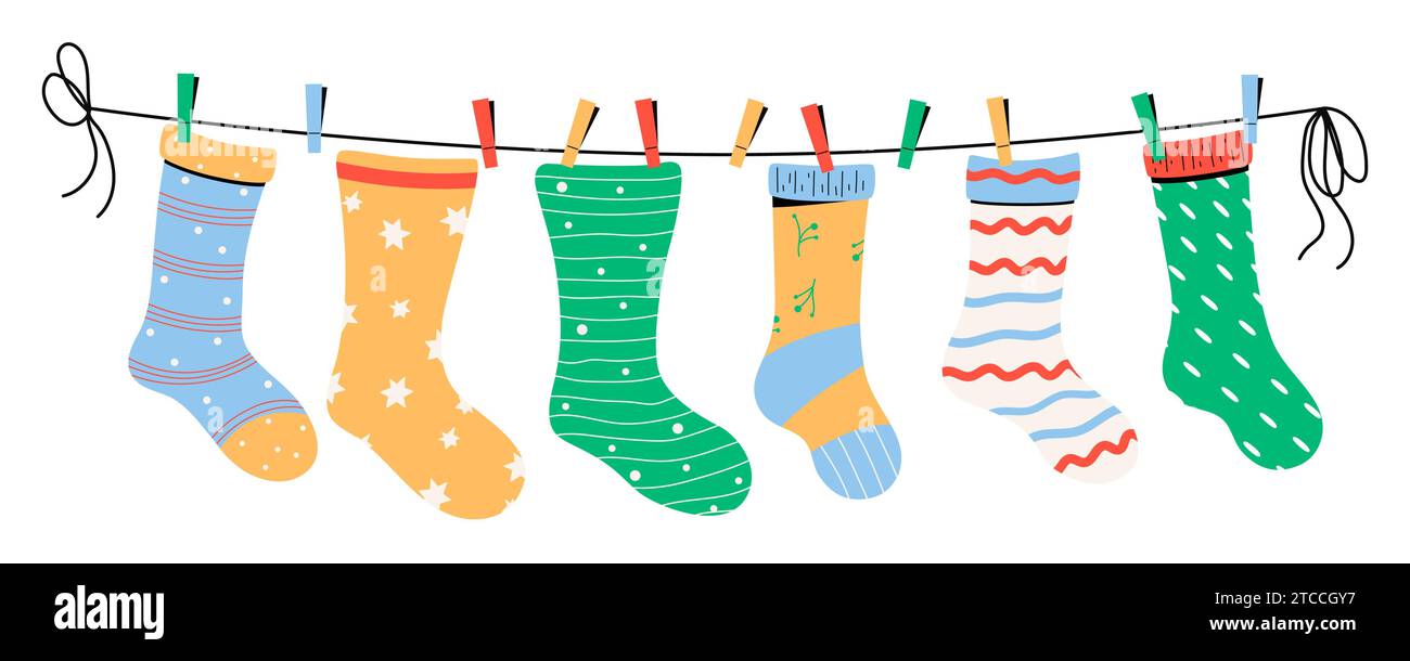 Baby socks with textures and patterns on clothes line. Vector illustration. Stock Vector