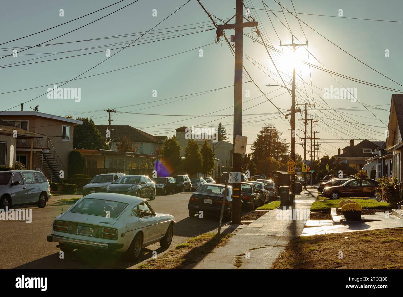 The residential streets of Oakland, San Francisco with overhead power lines and telephone cables Stock Photo