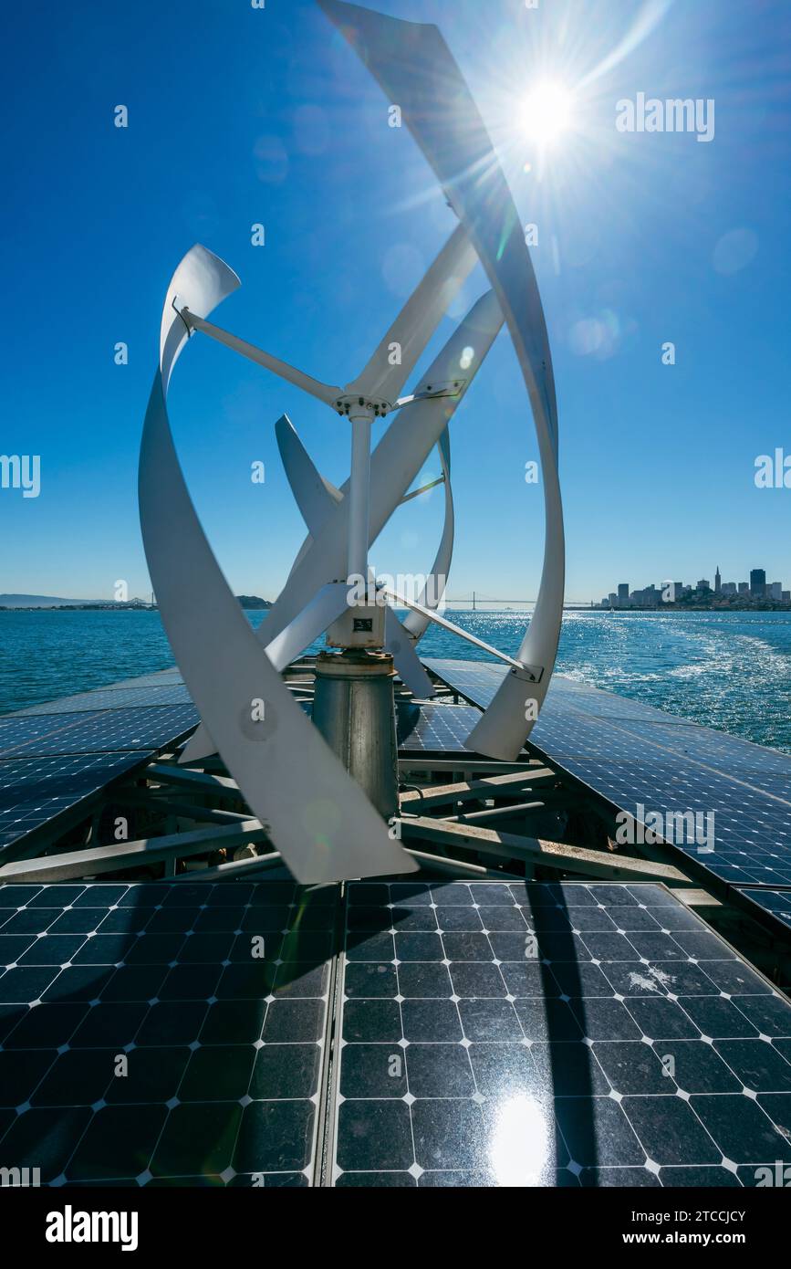 A wind turbine and solar panels on the top of the ferry from Alcatraz Island in San Francisco USA Stock Photo