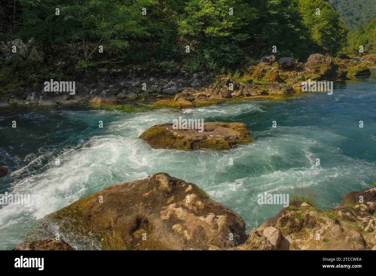 The River Una at the bottom of Strbacki Buk, a terraced waterfall on the border between Bosnia and Herzegovina and Croatia. Early September Stock Photo