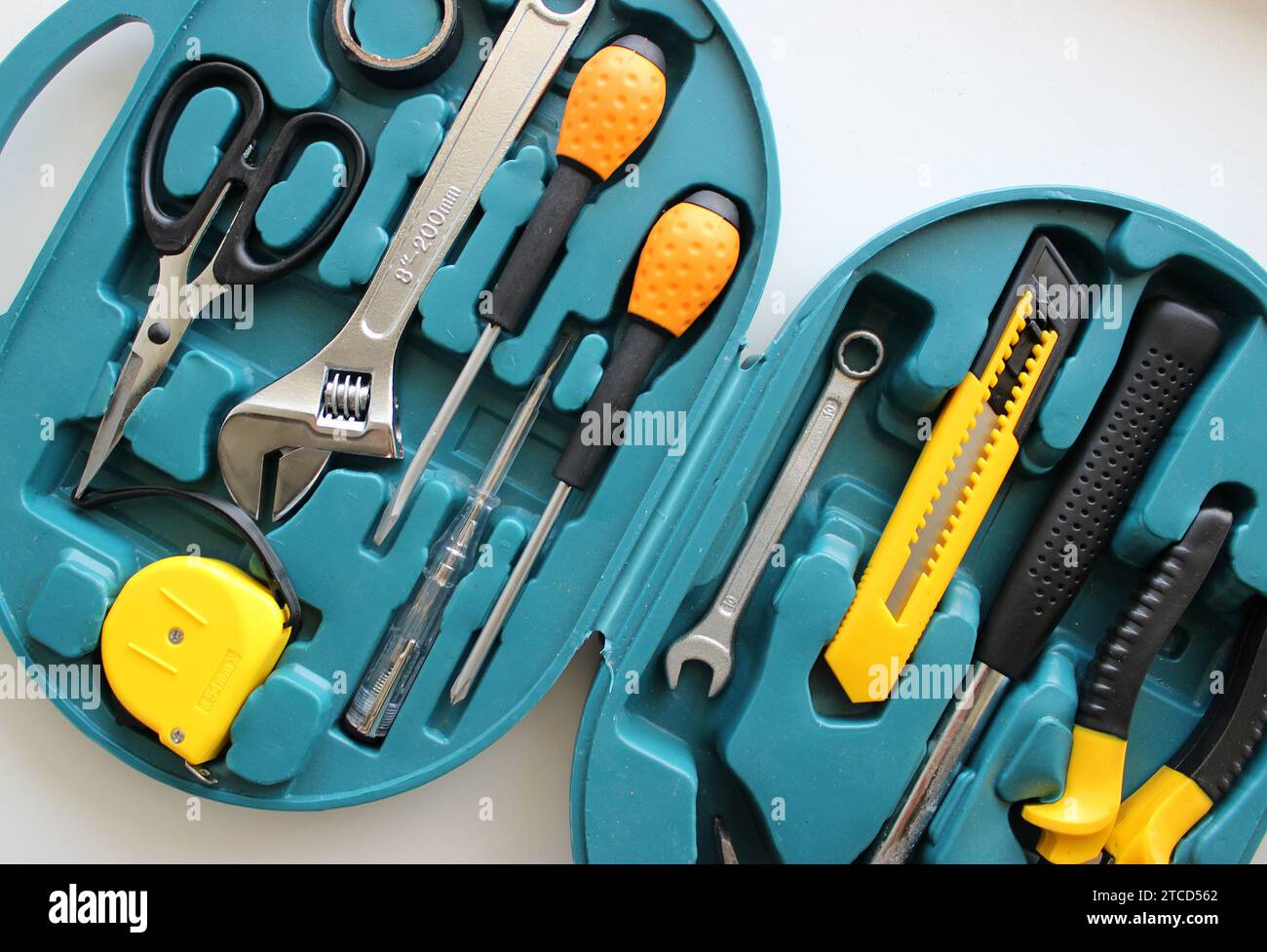 Opened oval case with tools and equipment for electrician closeup stock photo Stock Photo