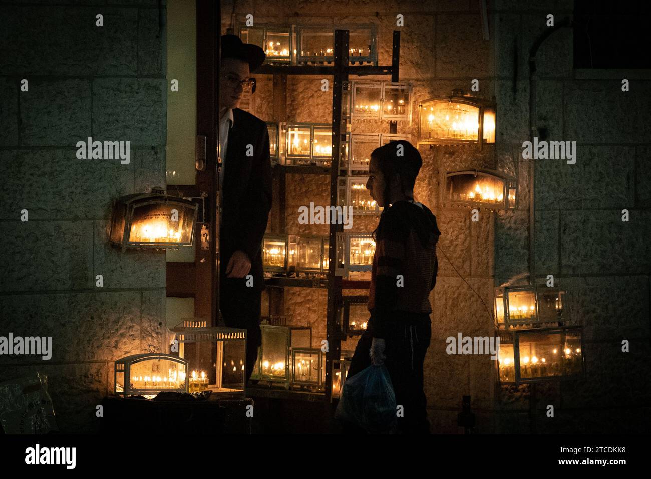 Jerusalem. 11th Dec, 2023. Candles for the festival of Hanukkah are lit in Jerusalem on Dec. 11, 2023. Credit: Chen Junqing/Xinhua/Alamy Live News Stock Photo