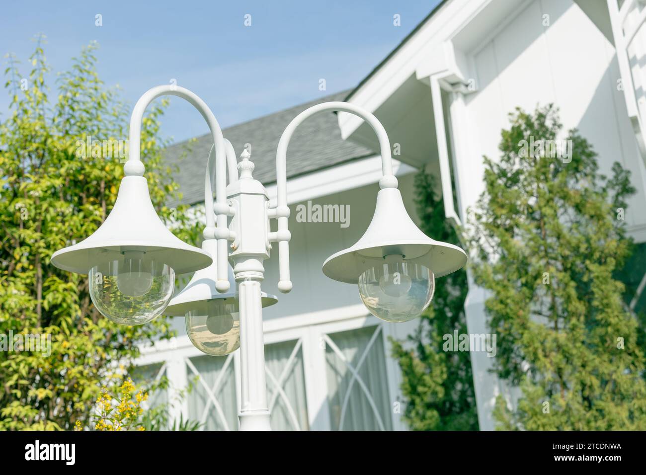 Home outdoor lighting weather proof lamps backyard garden decoration clean white art vintage style. Stock Photo
