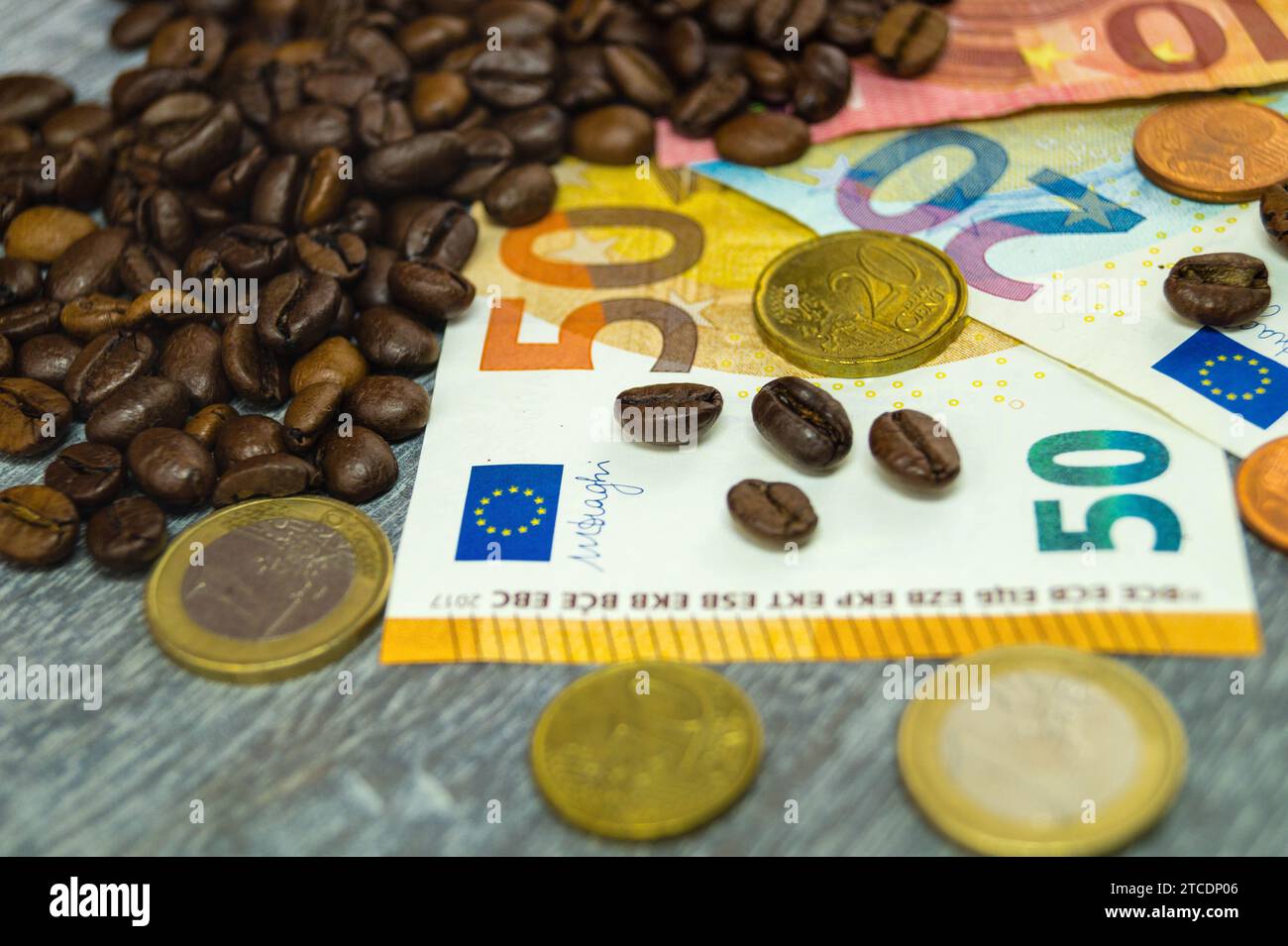 coffee beans with Euro, price increase of coffee Stock Photo Alamy