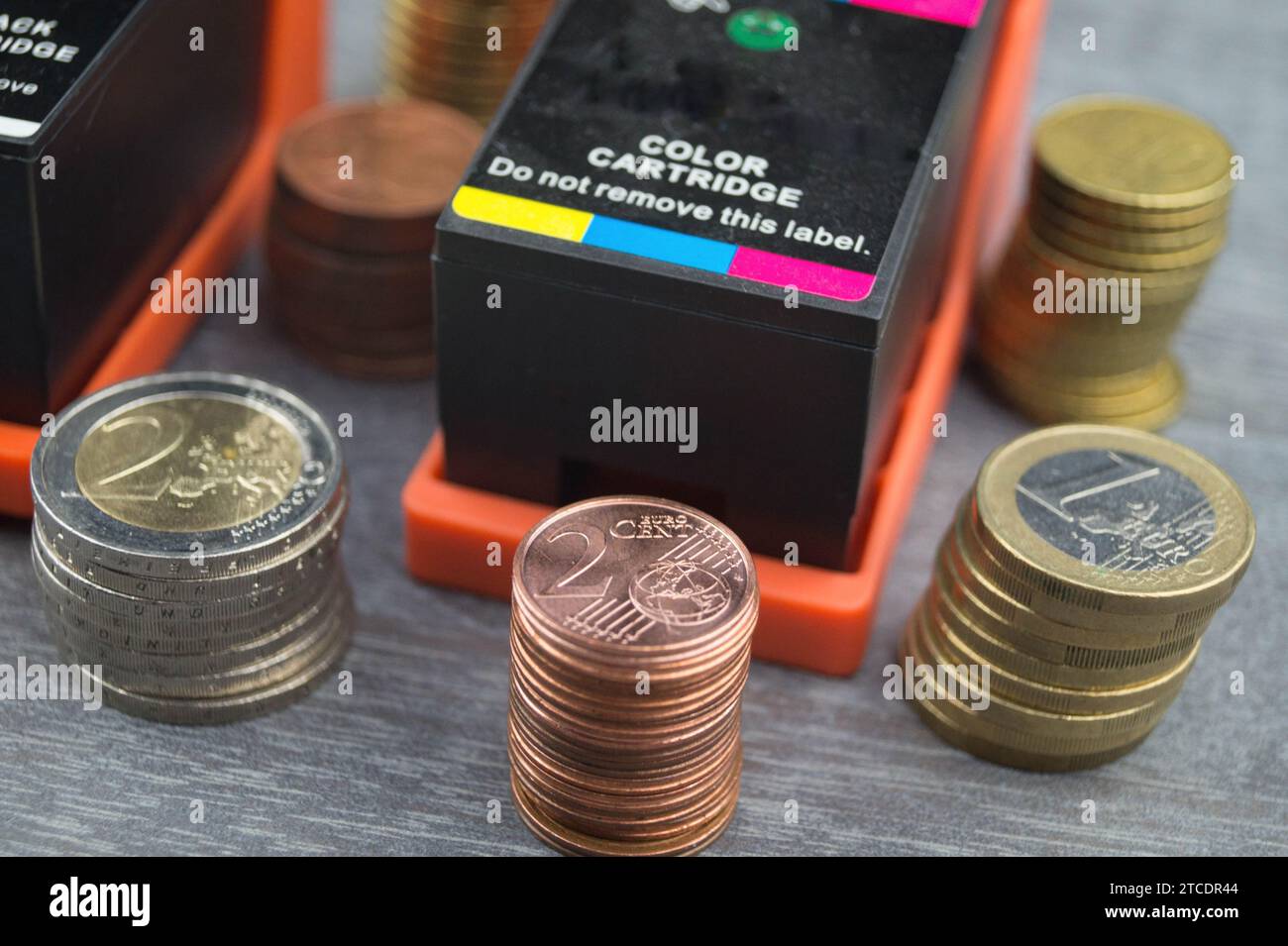 ink cartridges with Euros, symbol picture for print costs Stock Photo