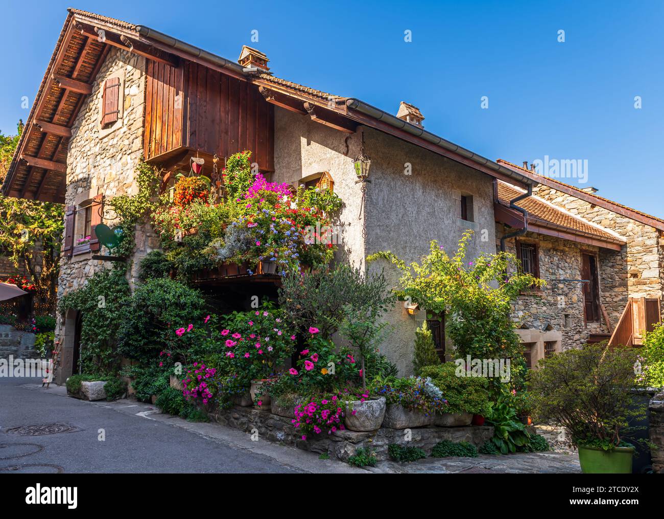 Very flowery house in the village of Yvoire on Lake Geneva, in Haute Savoie, France Stock Photo