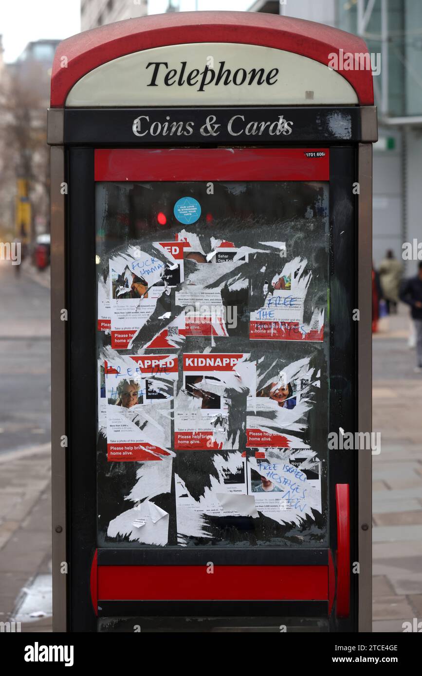 Posters of Israeli hostages pictured having been torn down in London, UK. Stock Photo