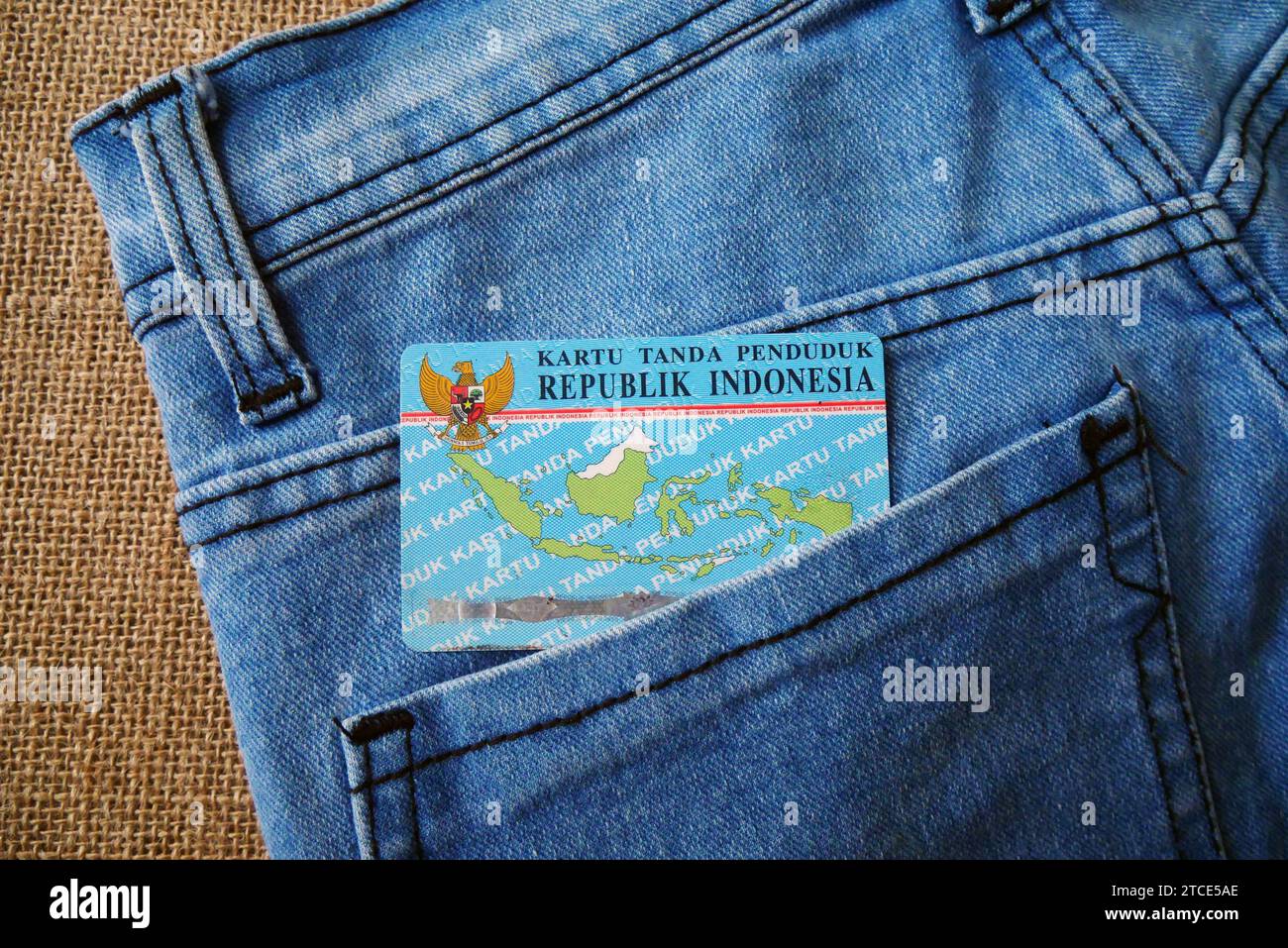 Indonesian identity card or KTP in light blue in a jean pocket Stock Photo