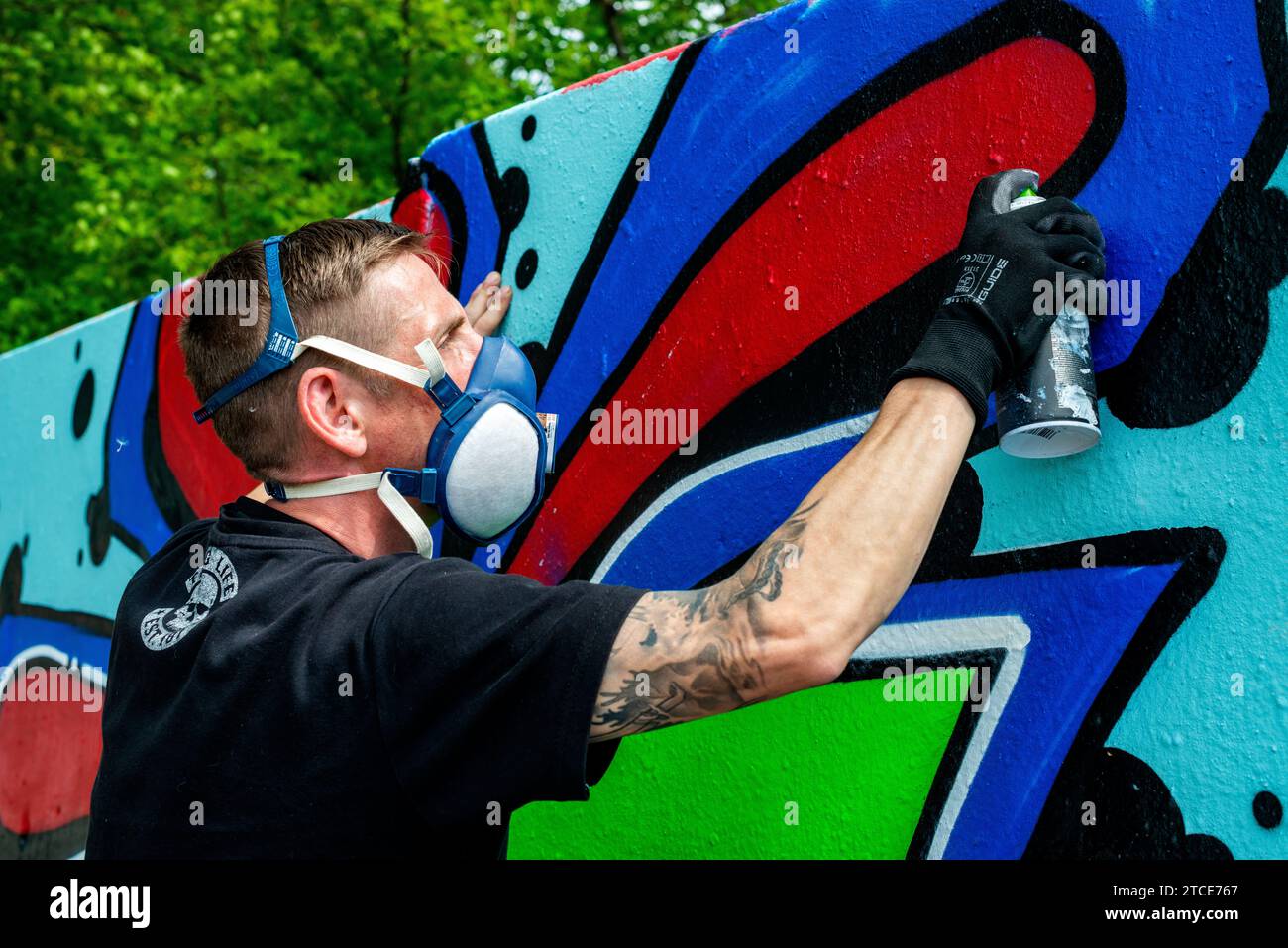Berlin, Germany. Graffiti artist creating jet another piece of urban ...