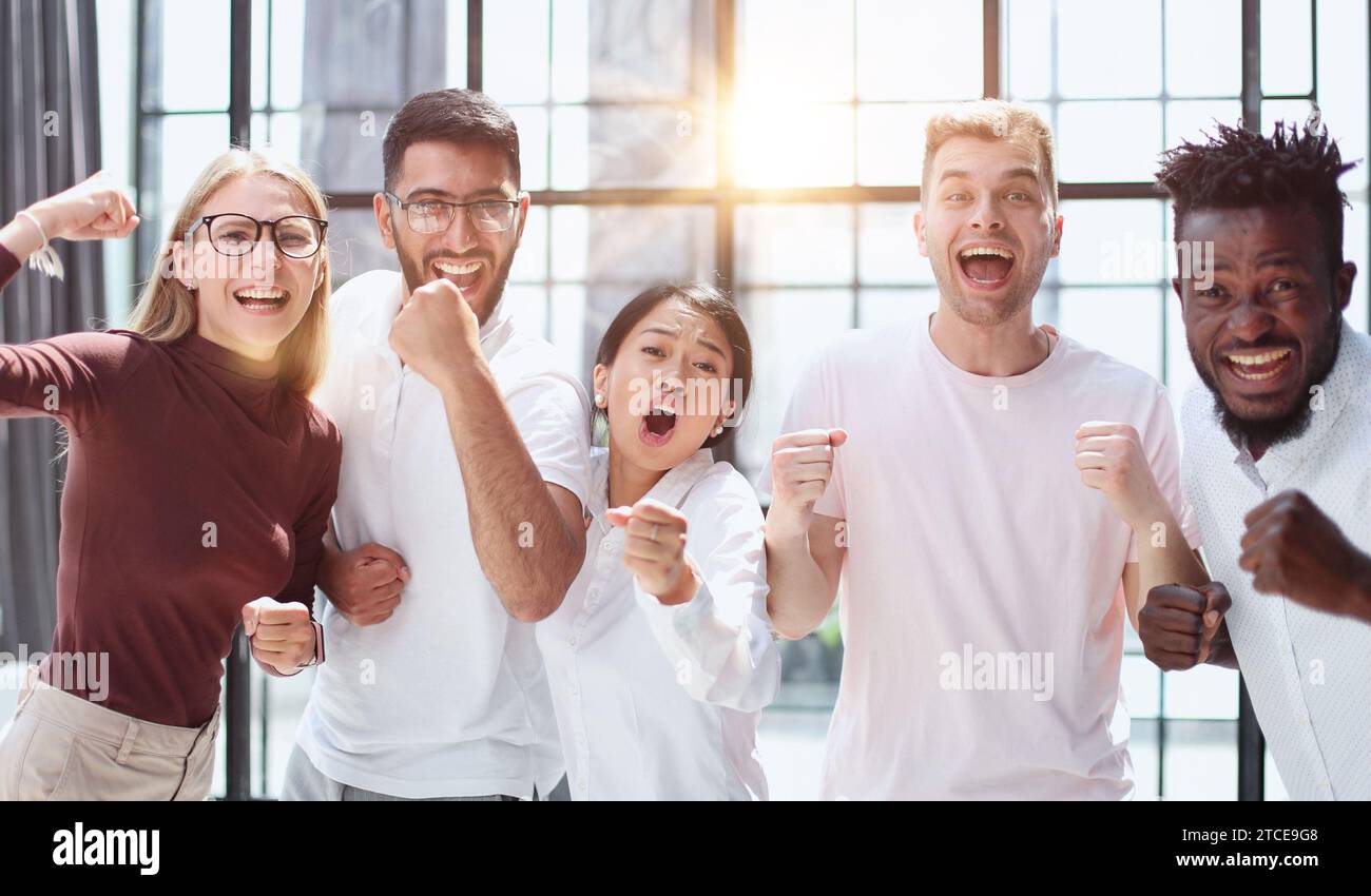 Business team celebrating victory in the office Stock Photo - Alamy